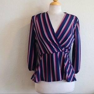 Peplum surpliced neck blouse